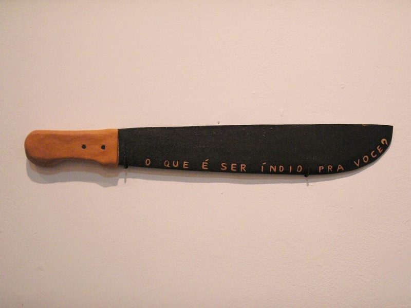 Photo of a ceramic sculpture of a machete. 