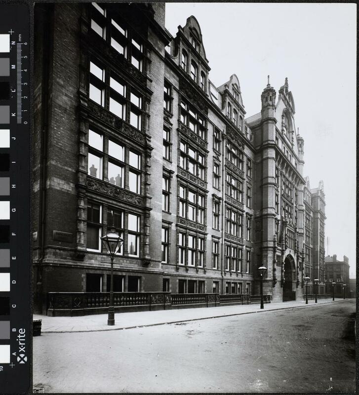 Exterior view of the Sackville Street building, along the visible length of Sackville Street there are old style street lamps. 